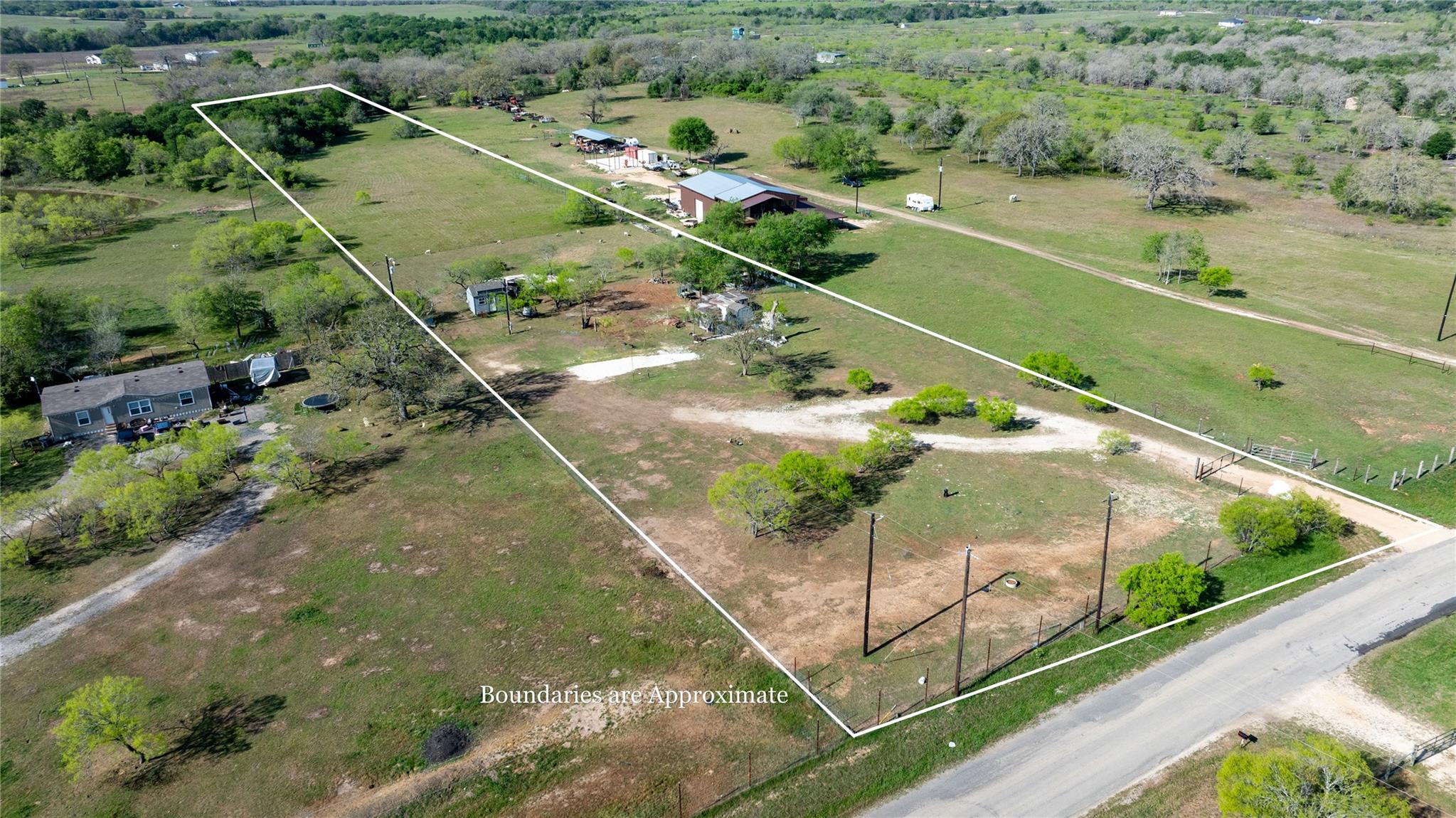 Vast acreage featuring multiple structures, an in