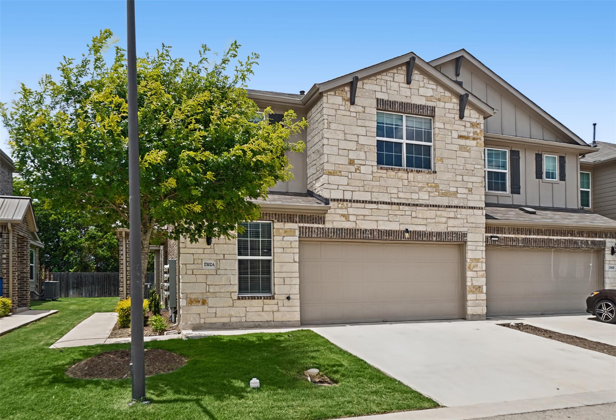 A striking stone and brick facade welcomes you to