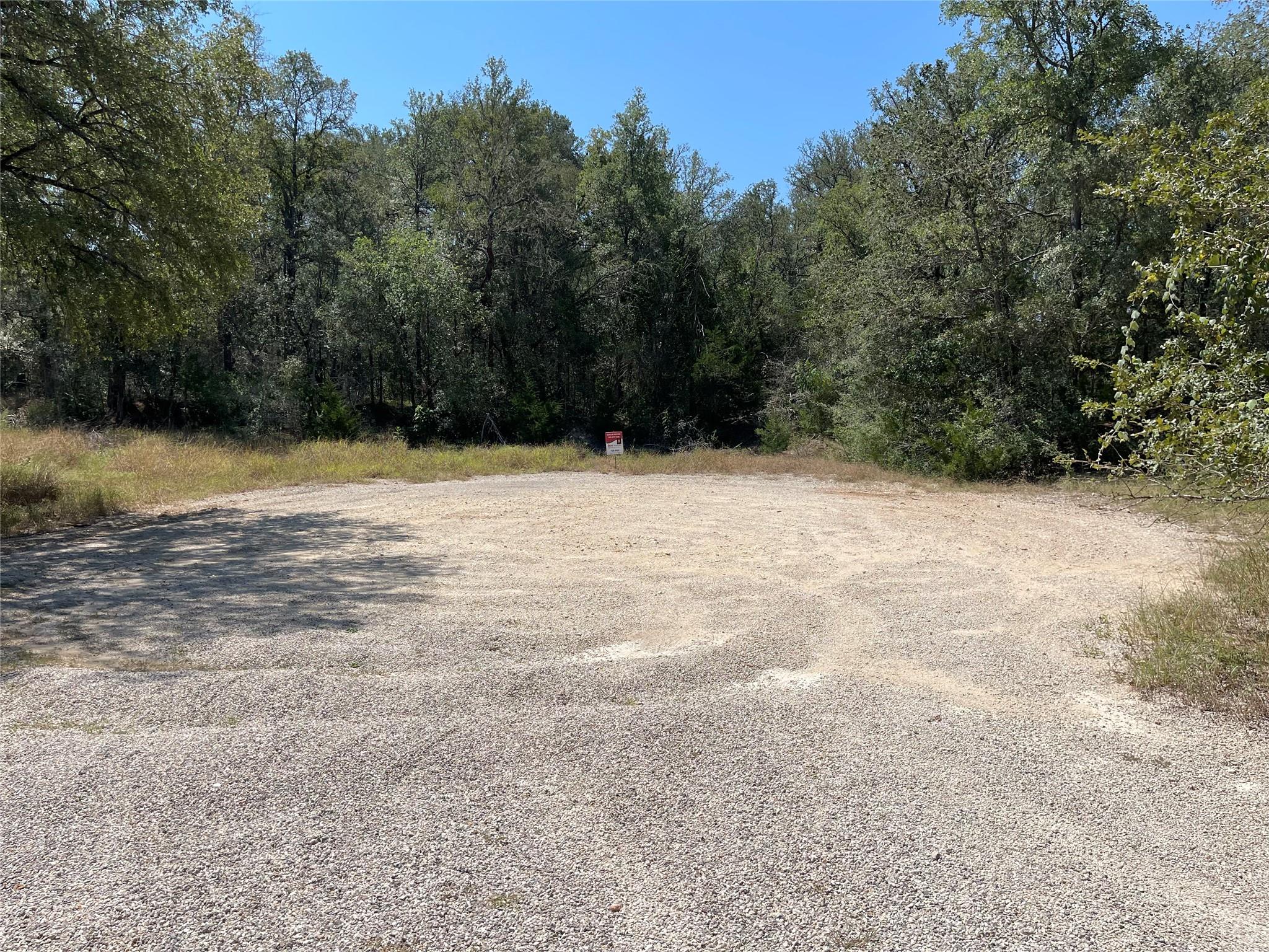 A spacious, level lot offers a pristine building 
