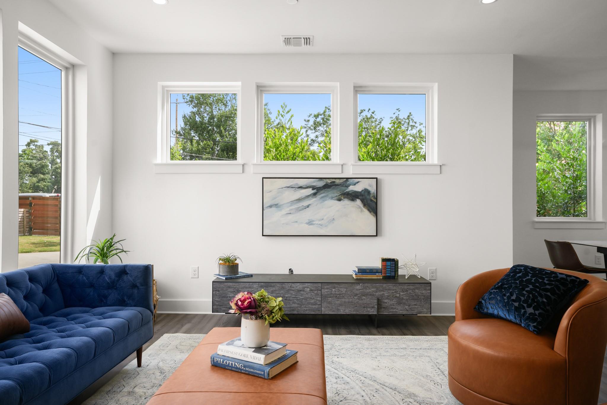 Natural light floods this inviting living space, 