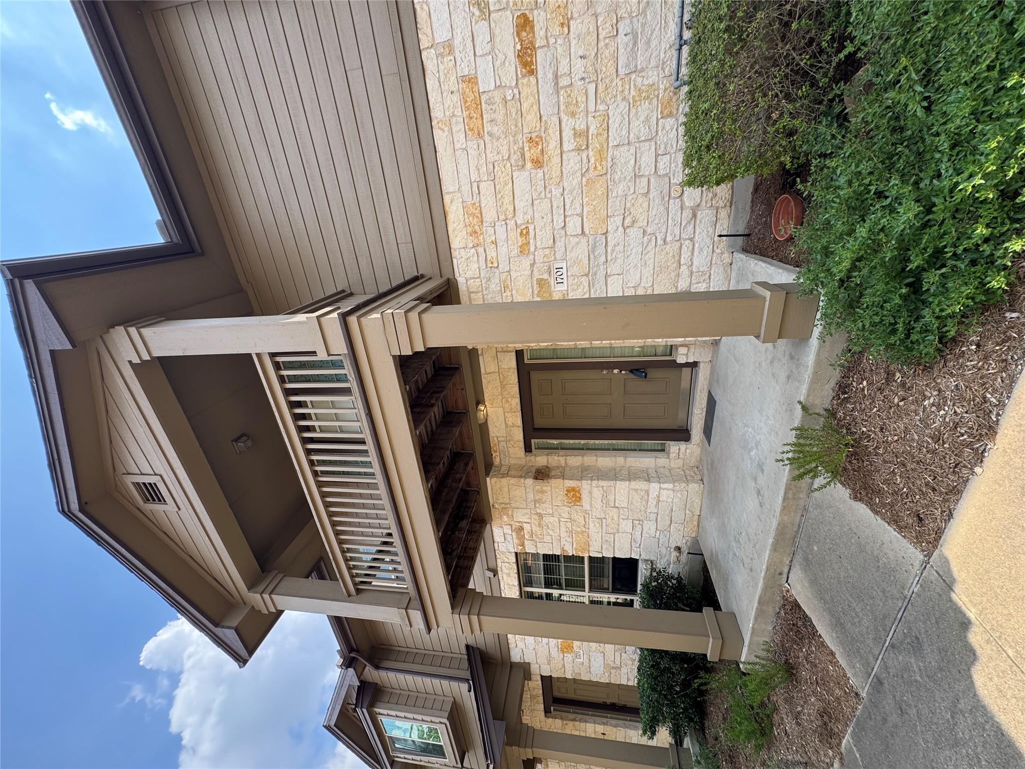 Natural stone masonry and a private upper balcony