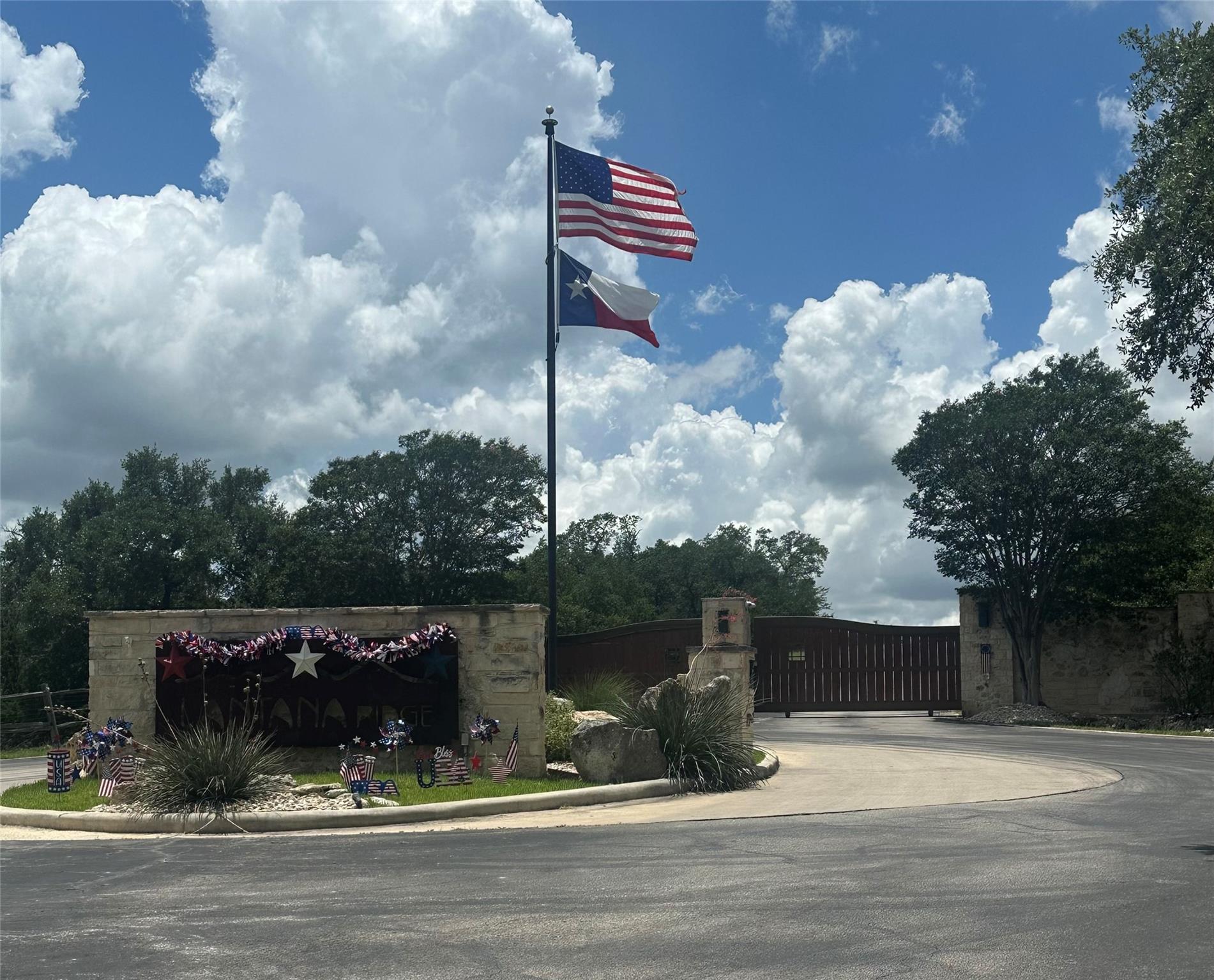 A grand gated entrance welcomes residents to this