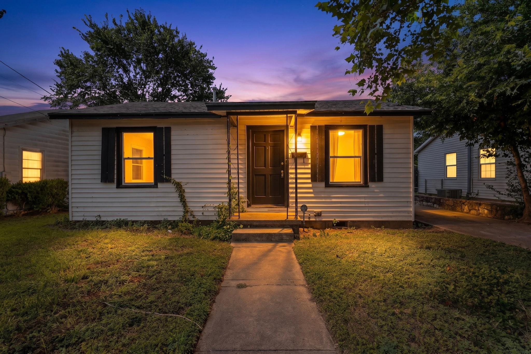 A welcoming front path leads to a home with class