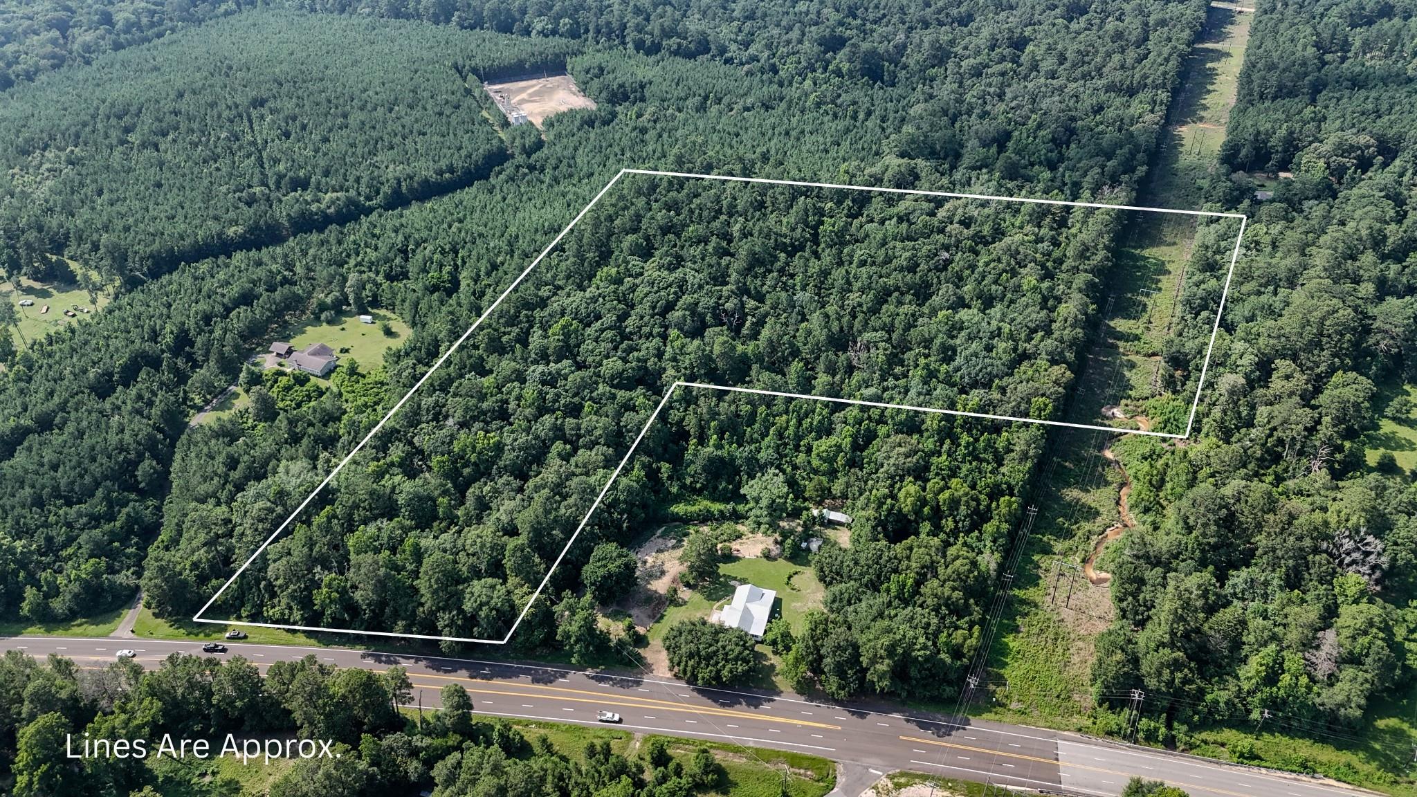 A sprawling, wooded acreage offers endless possib