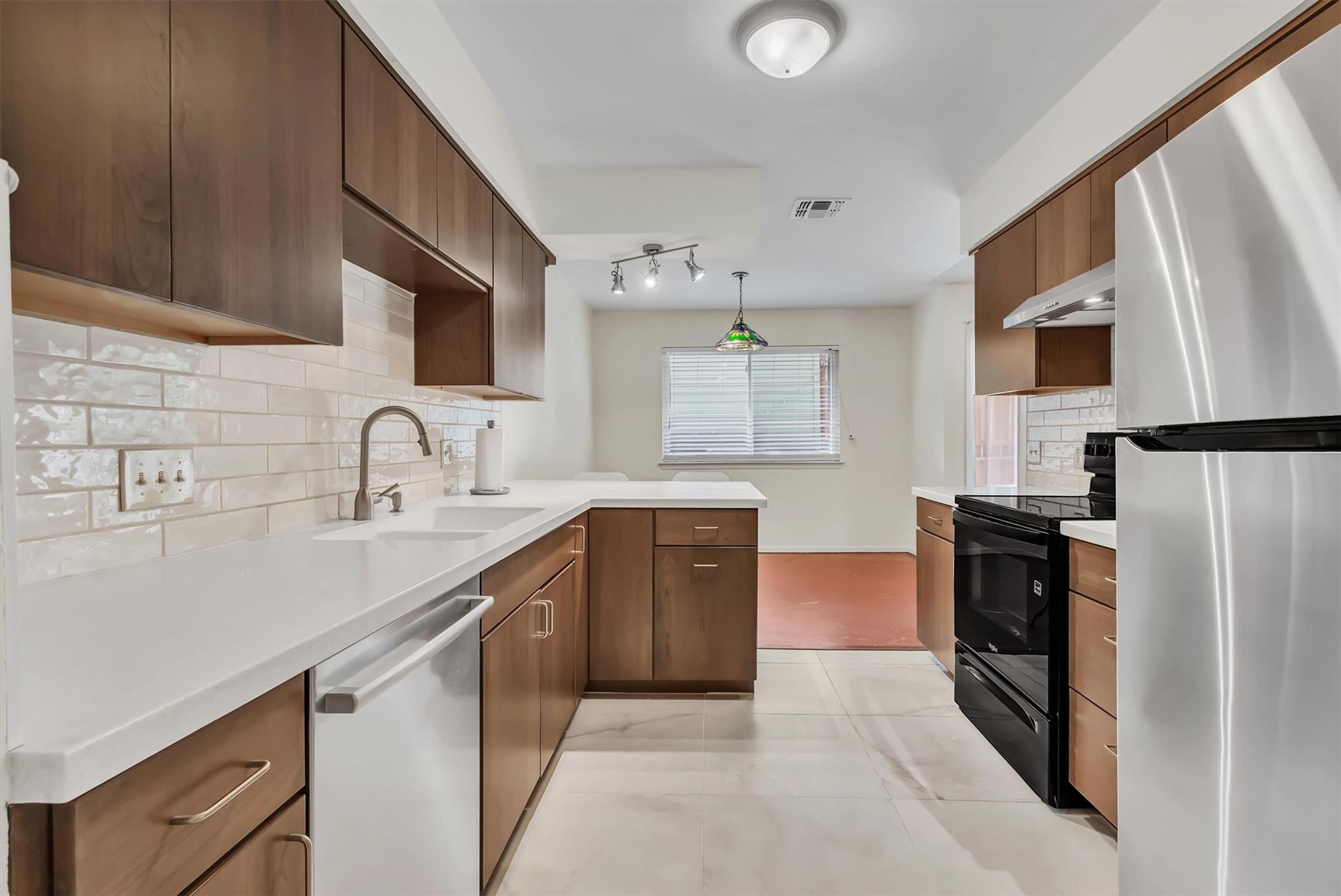 Functional kitchen with ample cabinet space, mode