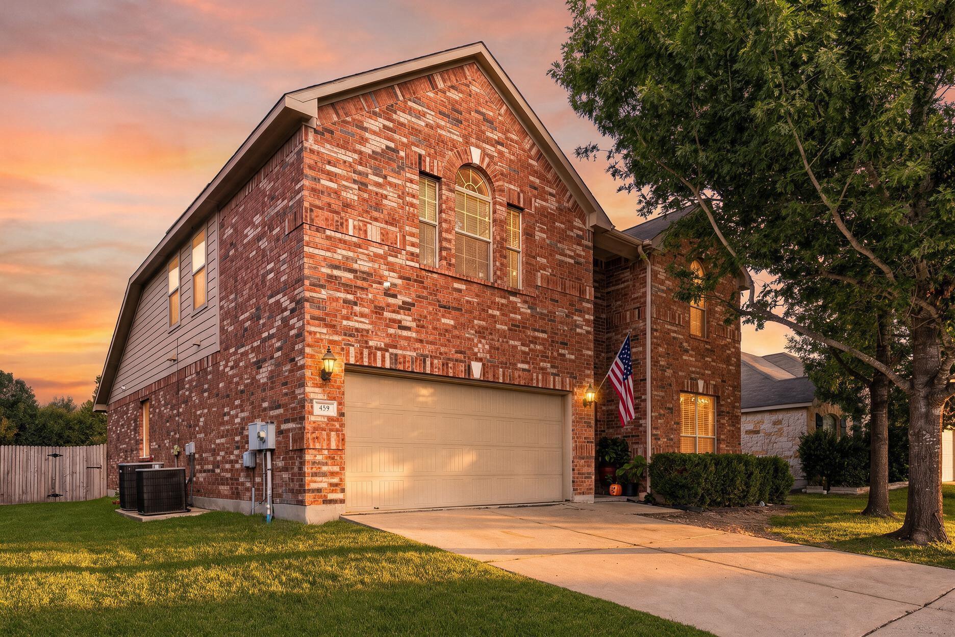 Multi-textured brick masonry highlights the exter