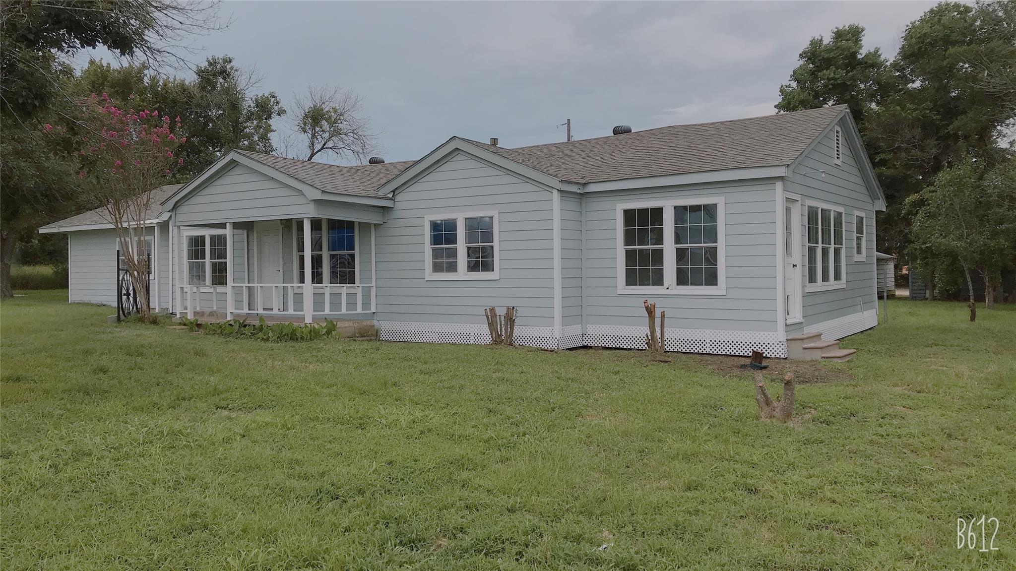 A charming single-story residence with a welcomin