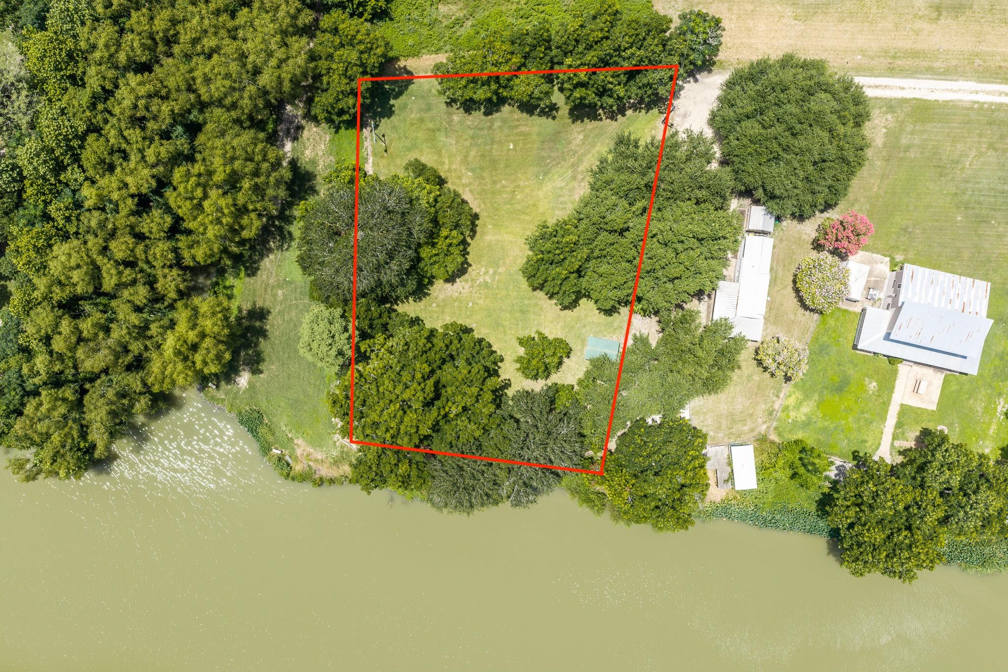 A verdant, well-maintained parcel offers tranquil