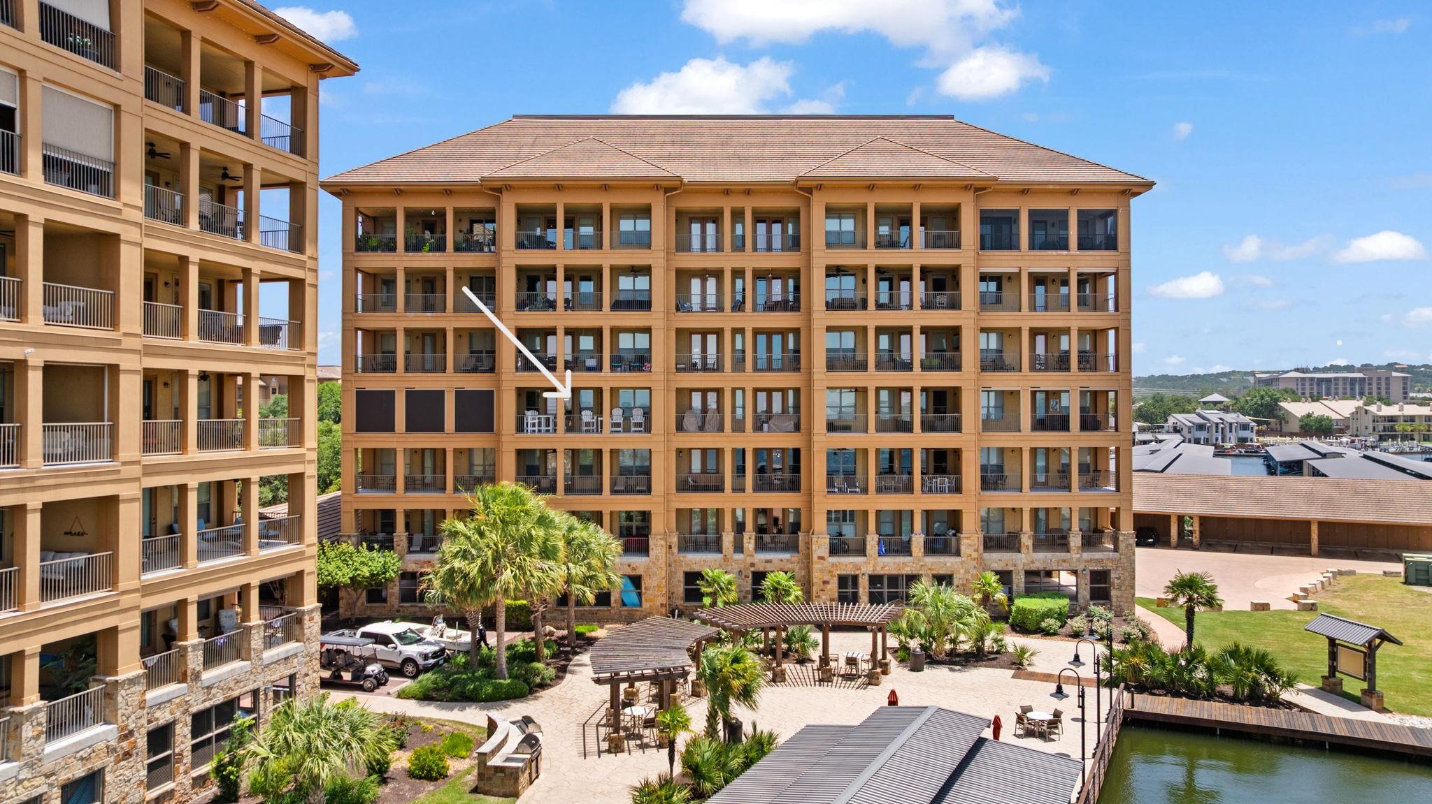 Multi-story condominium complex boasts private ba