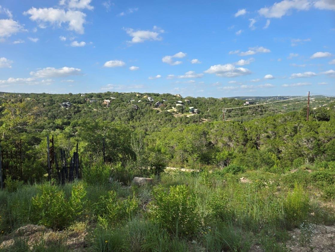 A tranquil panorama of lush green hills and dista