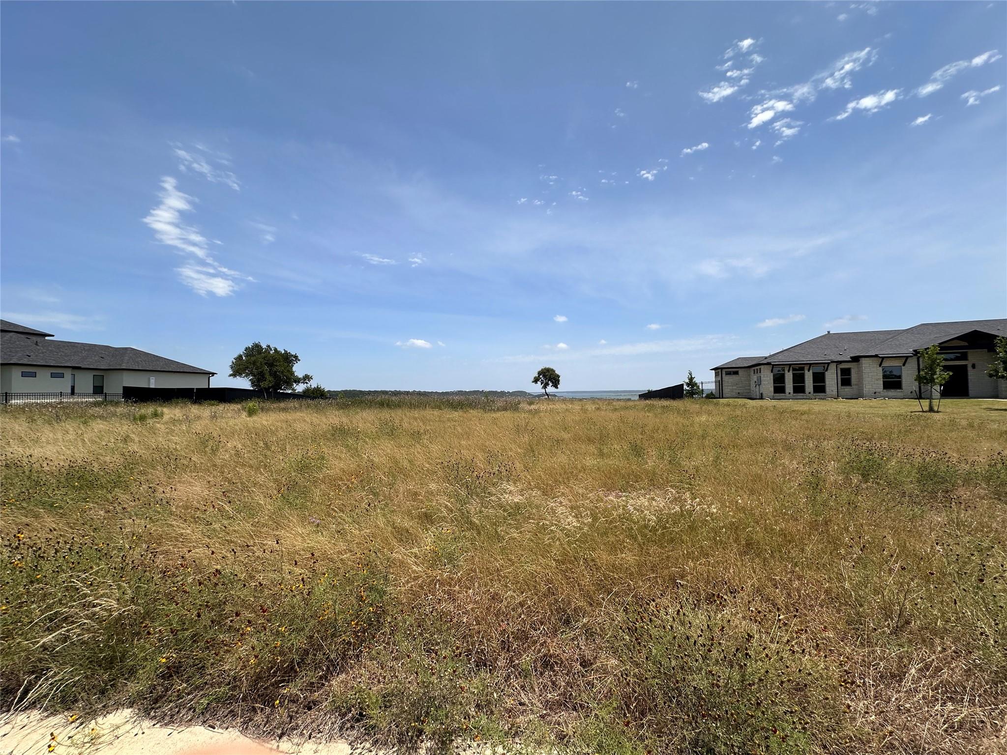 A spacious lot with ample room for development, o
