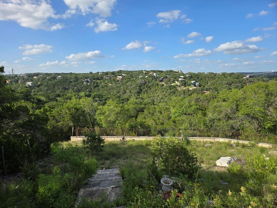 A peaceful landscape with verdant trees and scatt