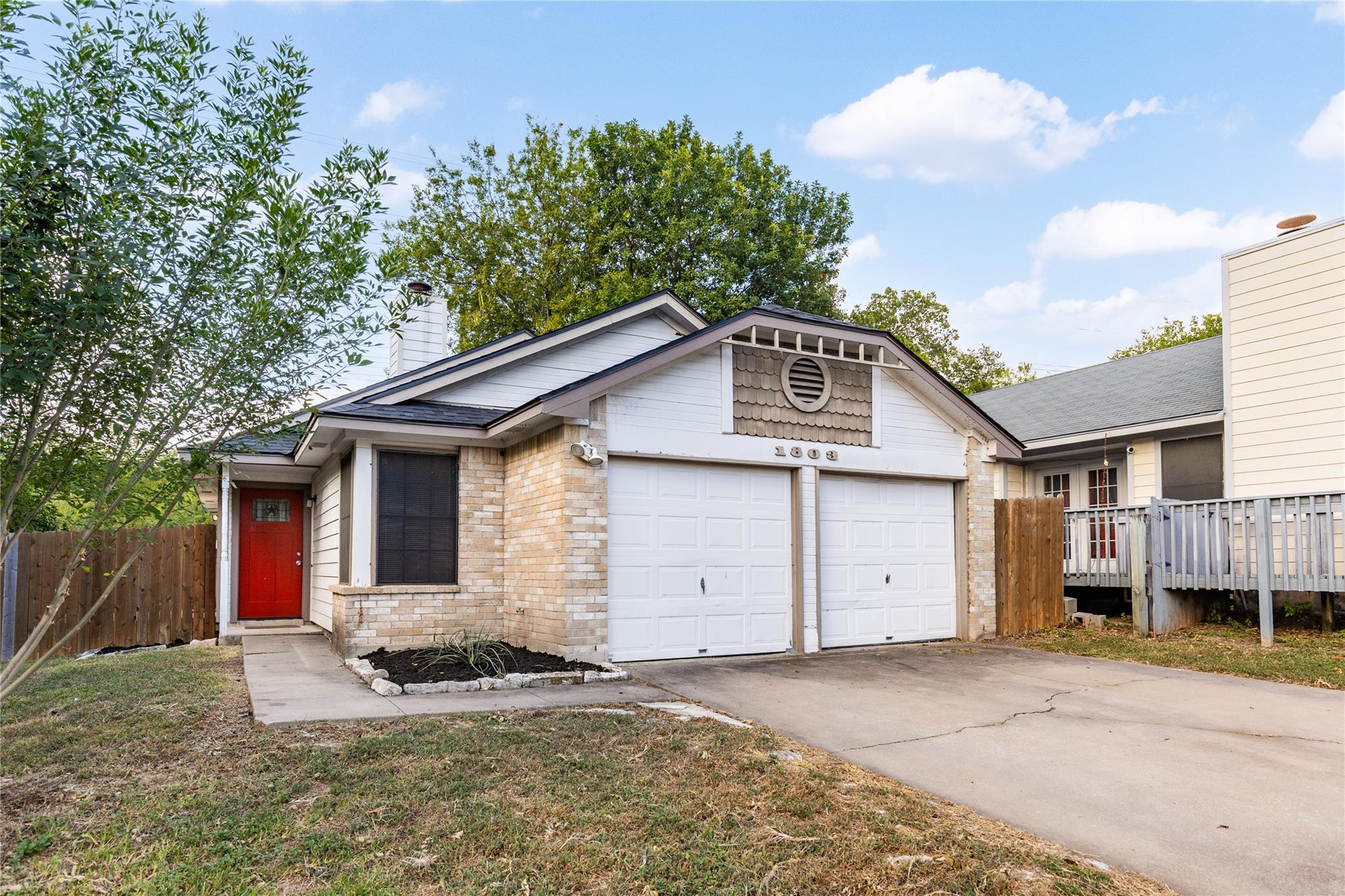 A charming single-family home awaits with a welco