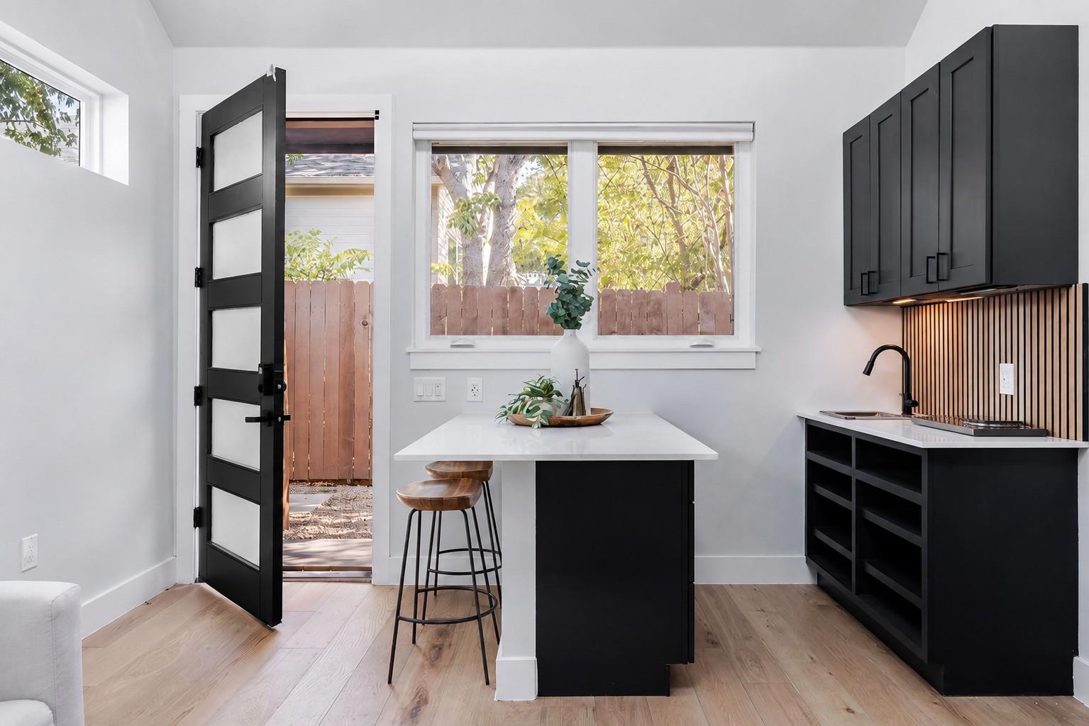 A well-appointed kitchen space offers an island w