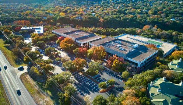 An aerial perspective reveals a verdant campus am