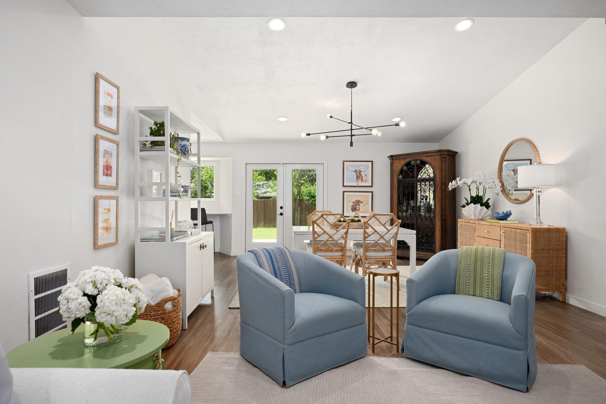 Enjoy an open-concept living space with sleek har