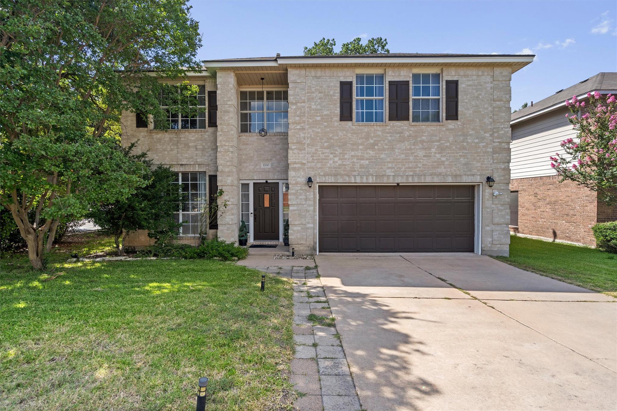 A classic brick exterior, complete with dark shut