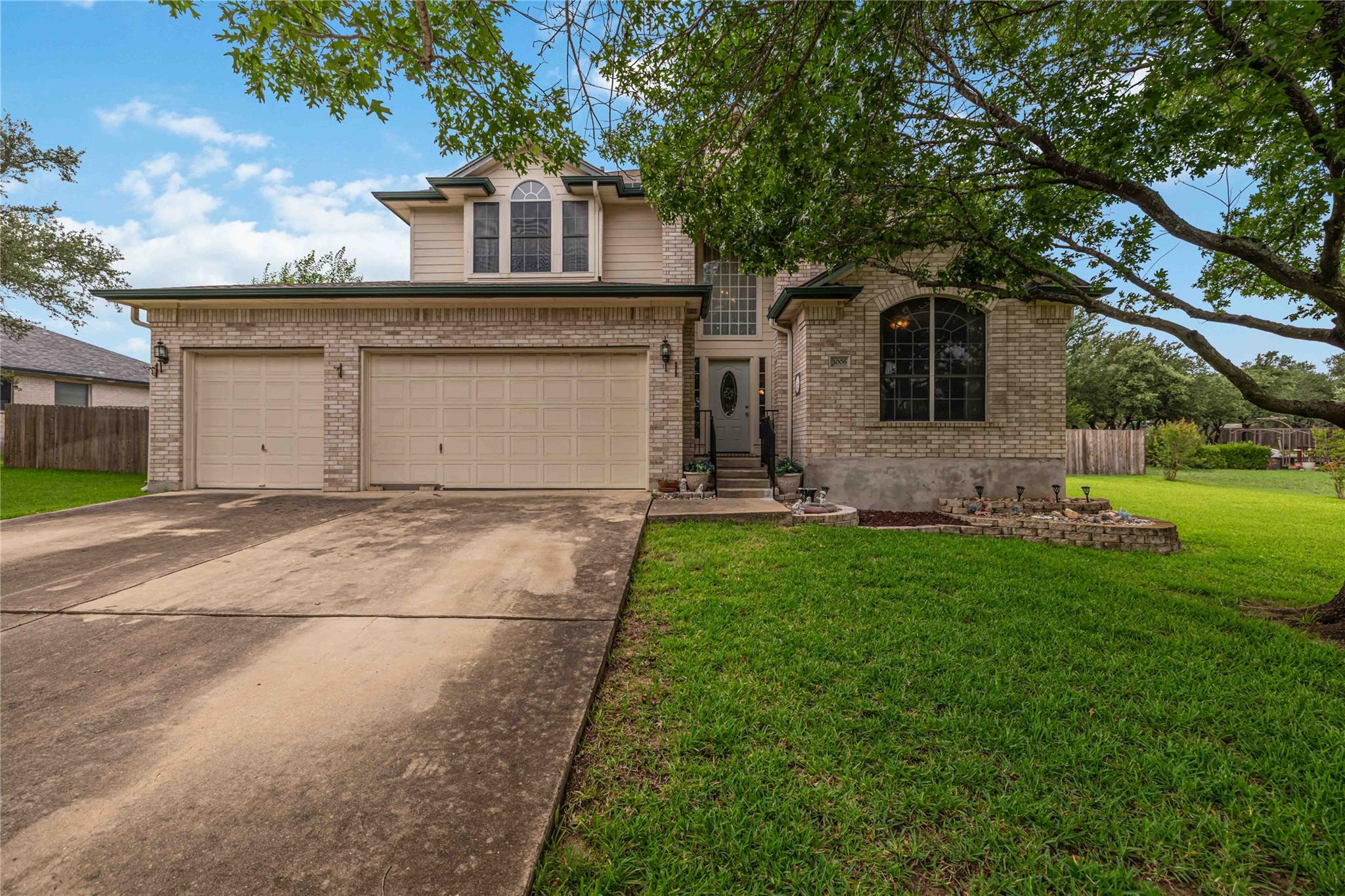 A classic brick exterior with a welcoming entrywa