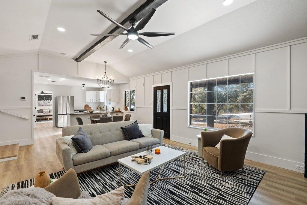 Natural light floods this inviting living space, 
