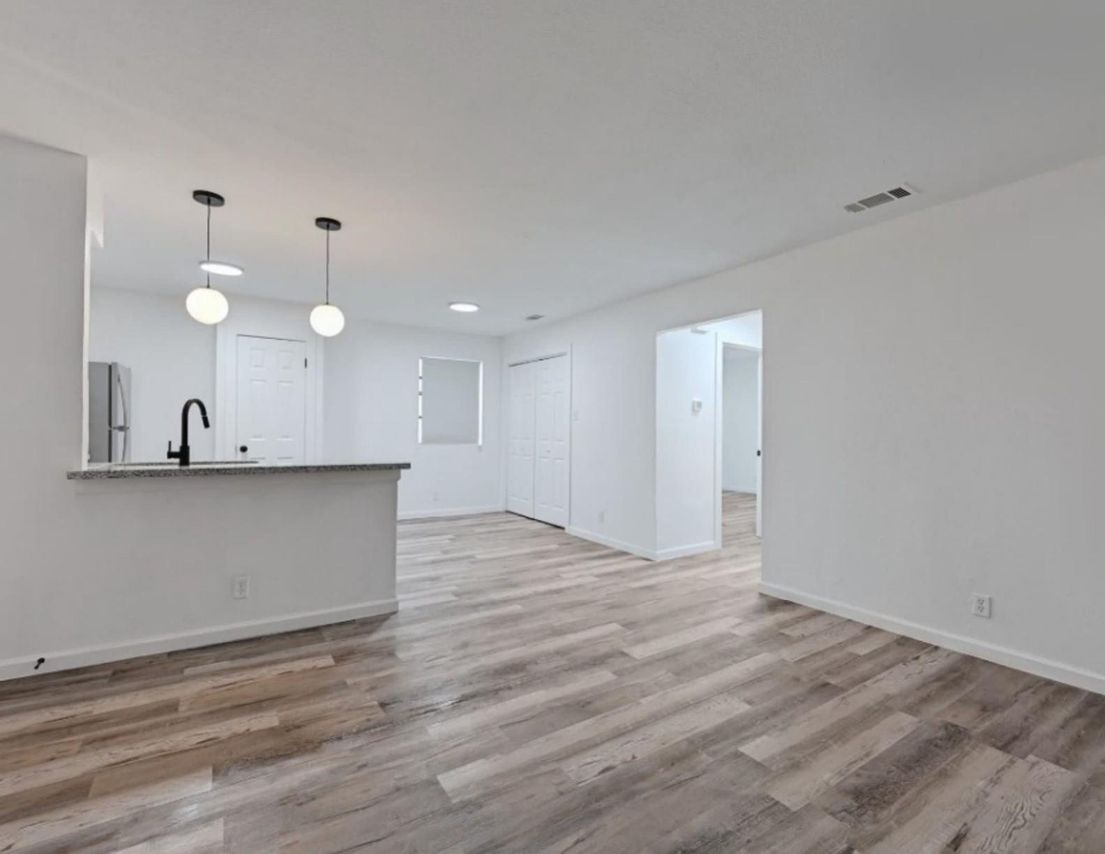 A contemporary open-concept layout highlights thi