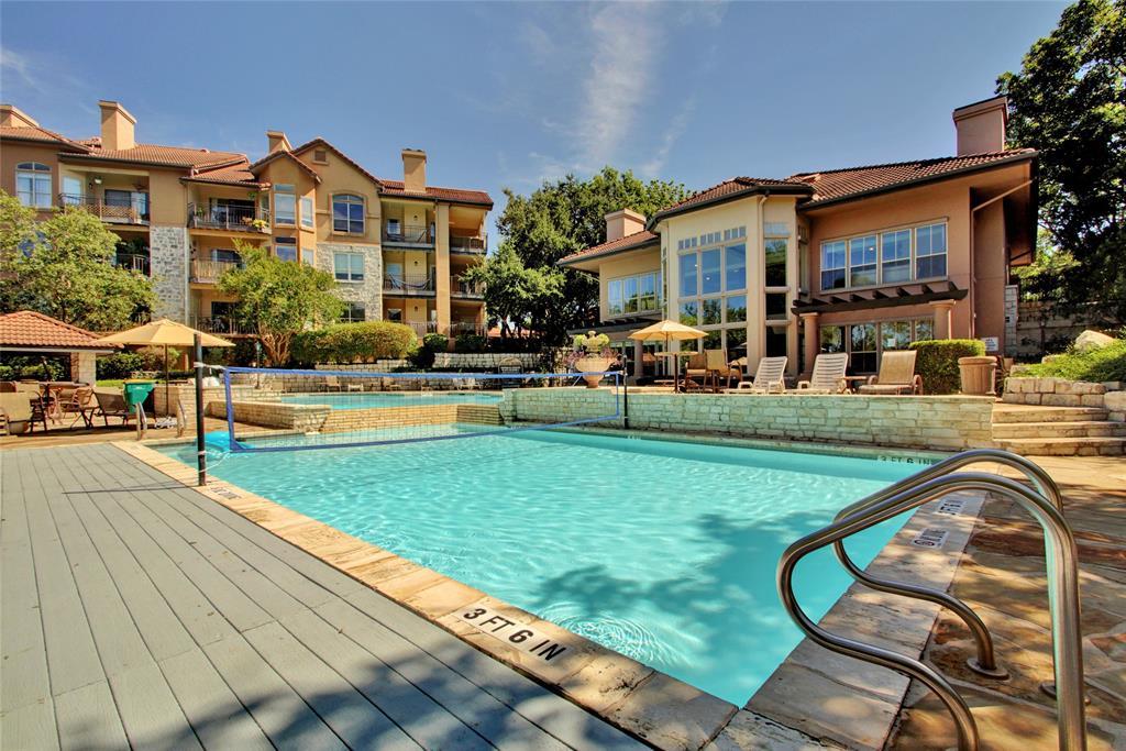 Lush landscaping and architectural charm surround