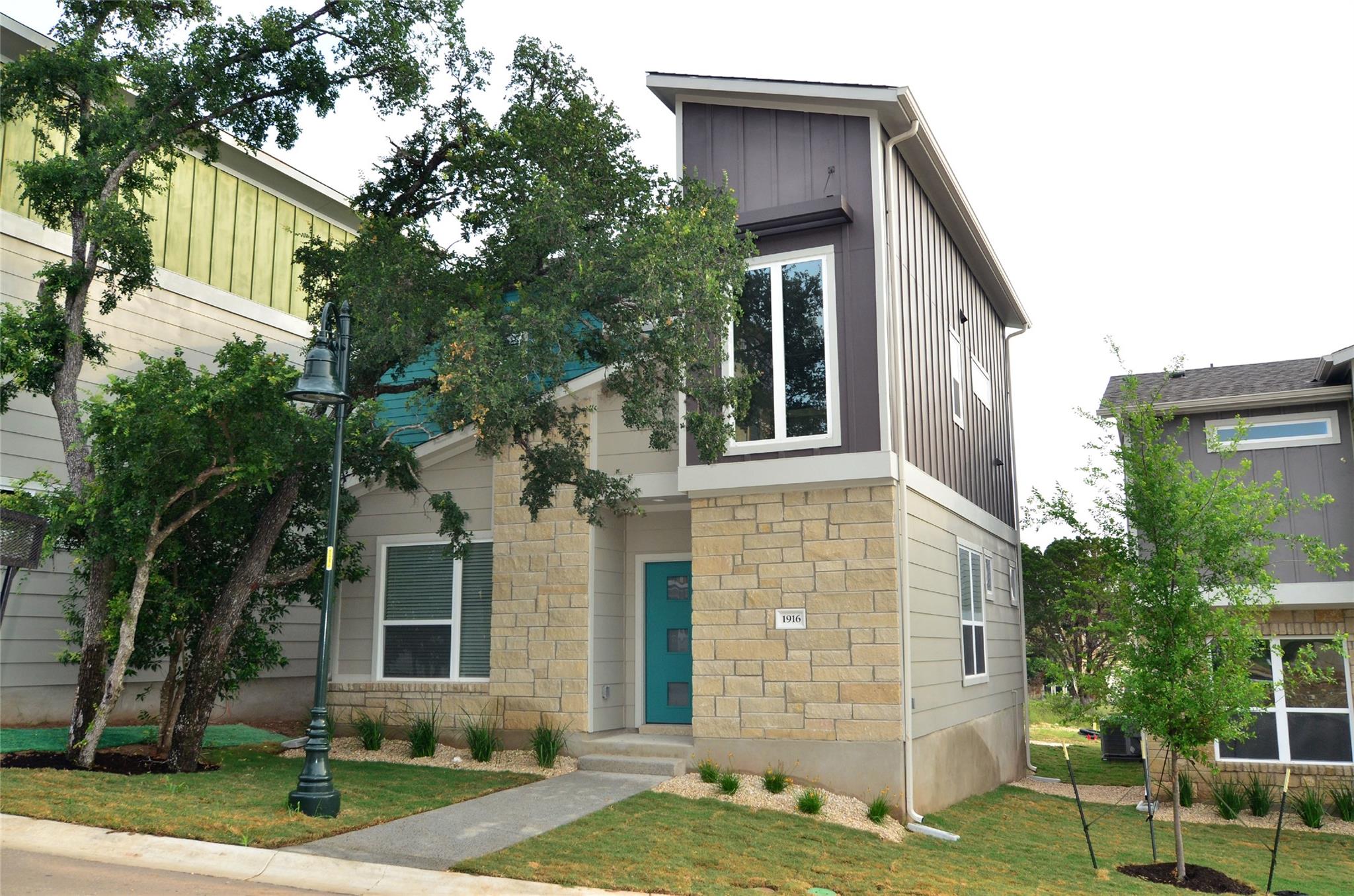A modern facade boasts a cheerful entrance, welco