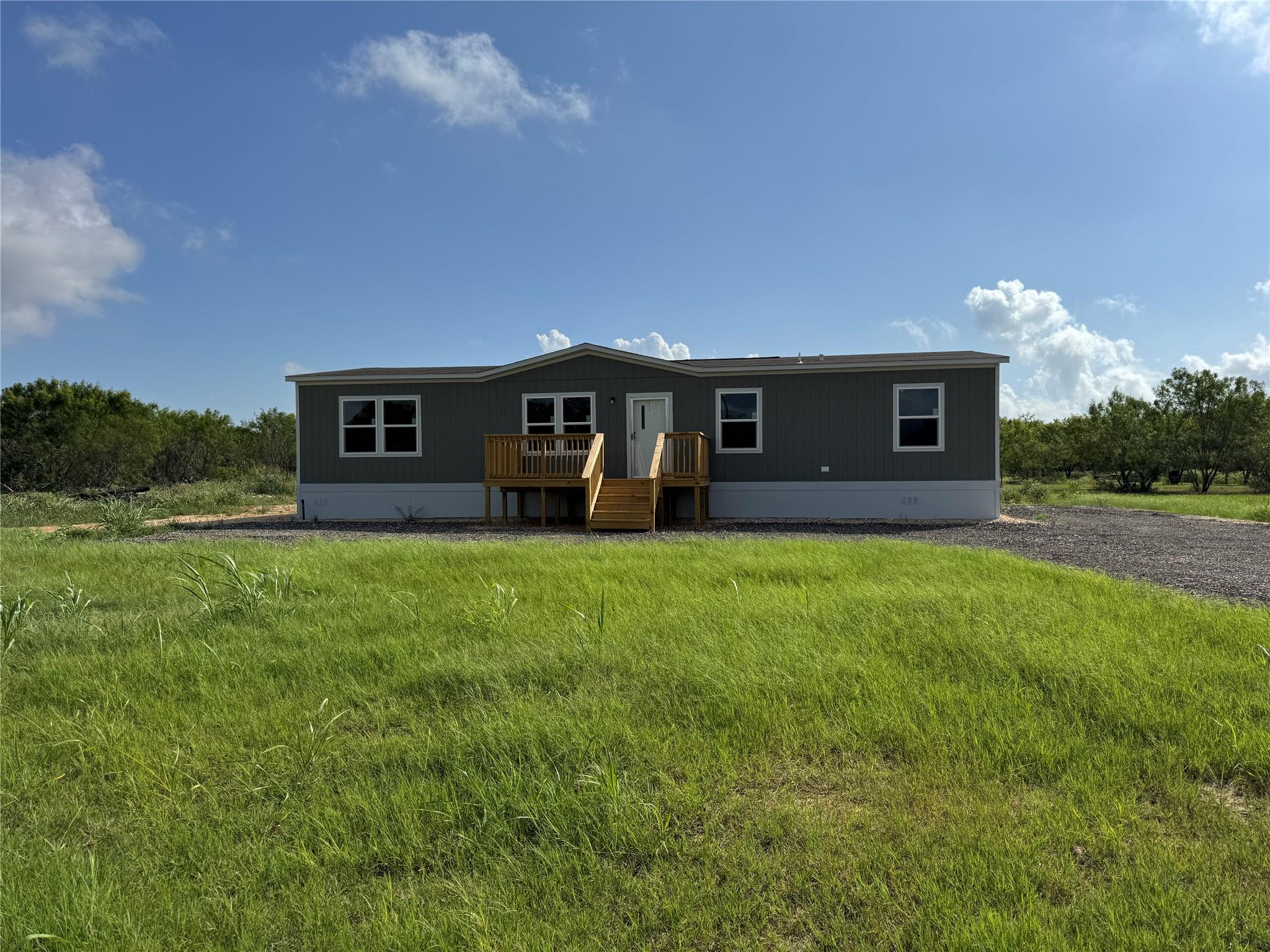 A well-maintained manufactured residence nestled 