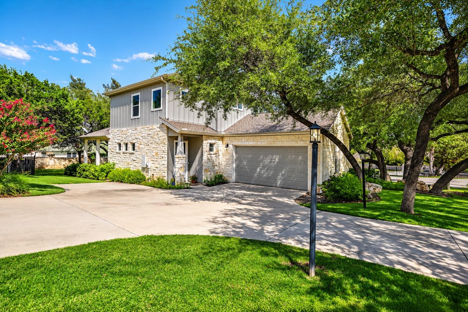 A stone and siding exterior creates classic curb 