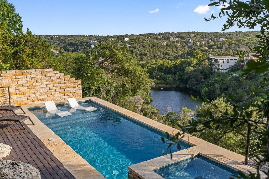 An inviting infinity-edge pool overlooks a serene