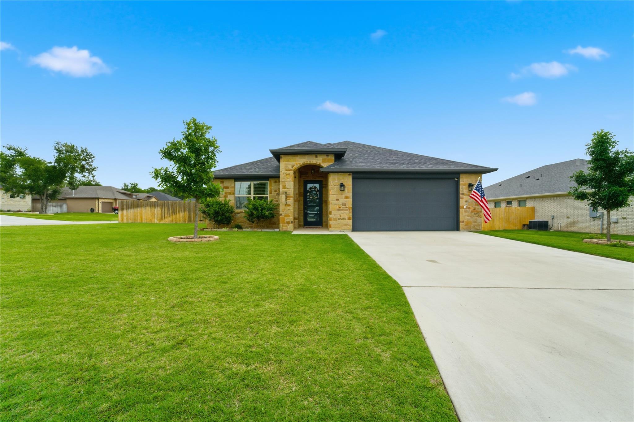 A welcoming front entry with stone accents and an
