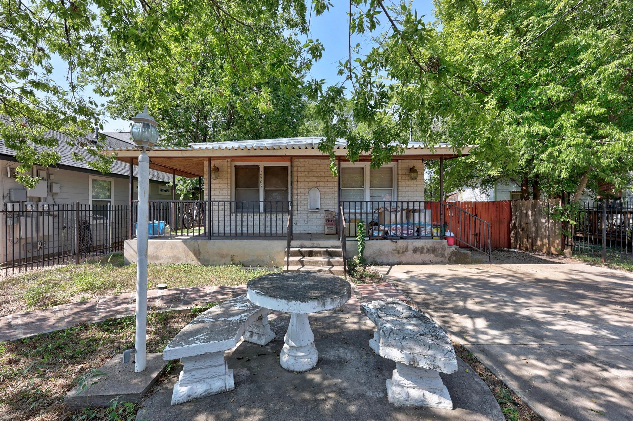 View of front of home featuring brick siding and 