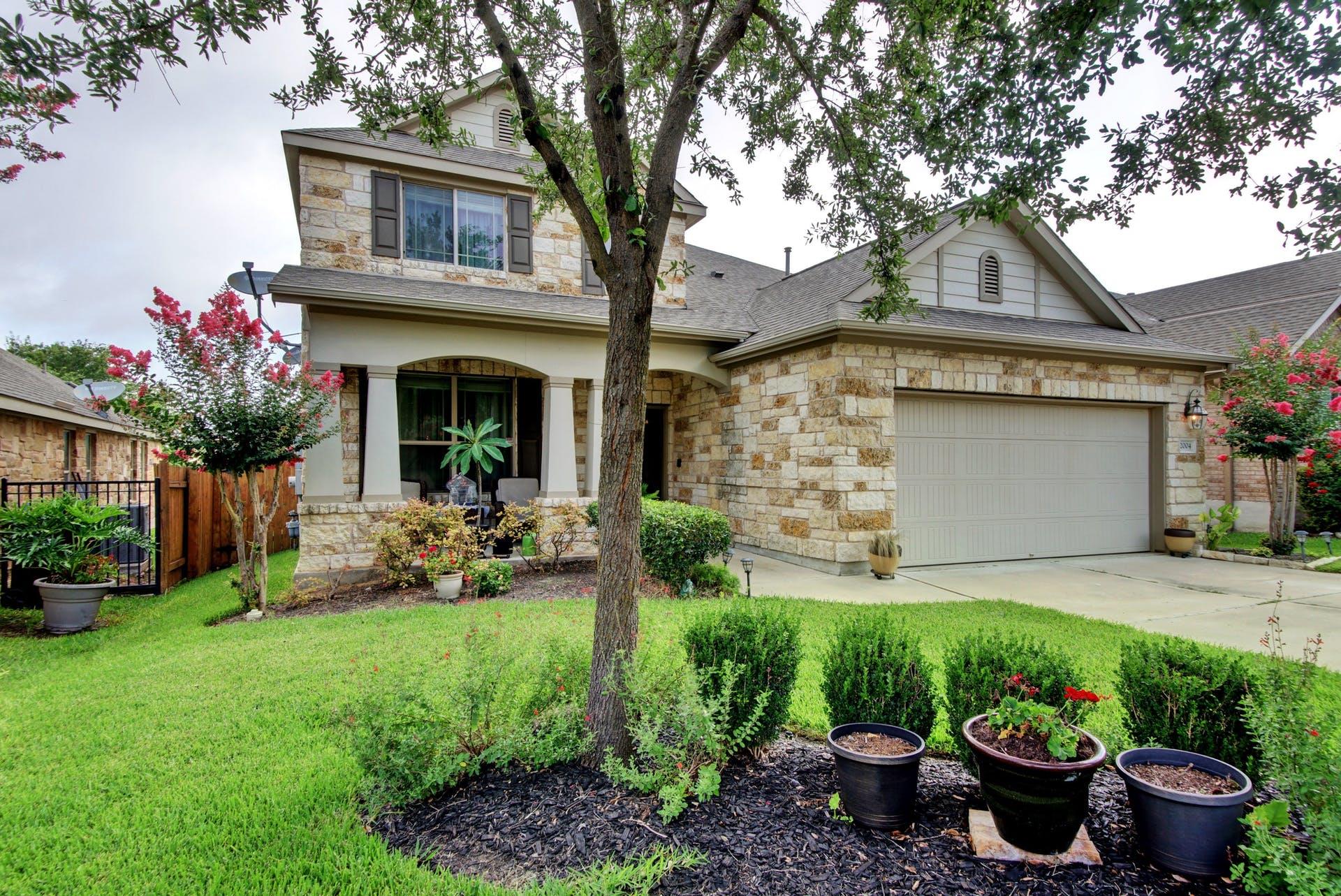 A well-maintained facade with stone accents and a