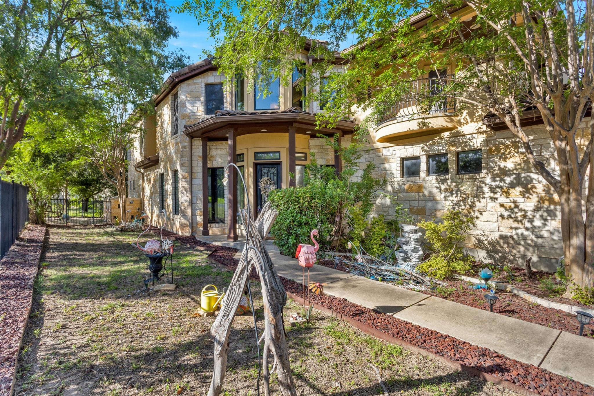 A grand entrance with rich stone construction and