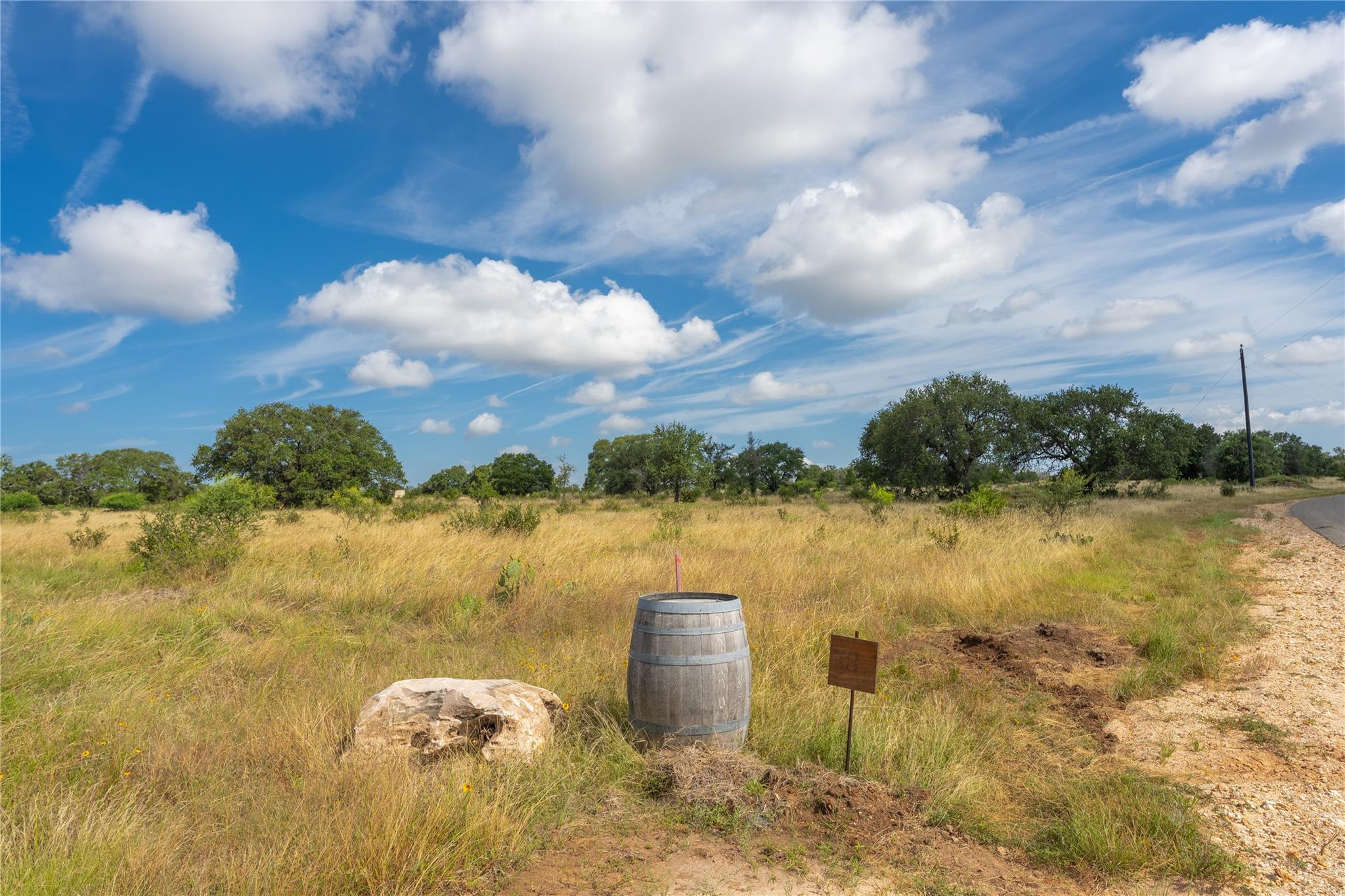 A tranquil, spacious lot awaits your vision, fram