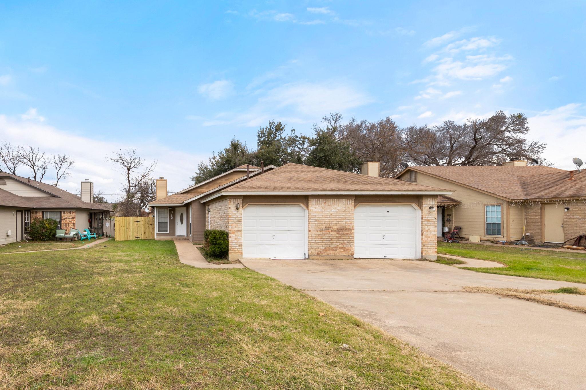 A classic brick exterior offers enduring charm wi