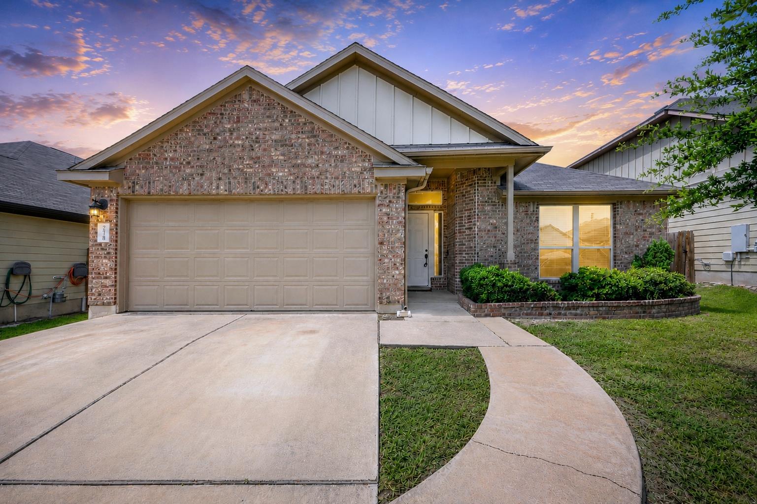 A classic brick exterior with a welcoming entrywa