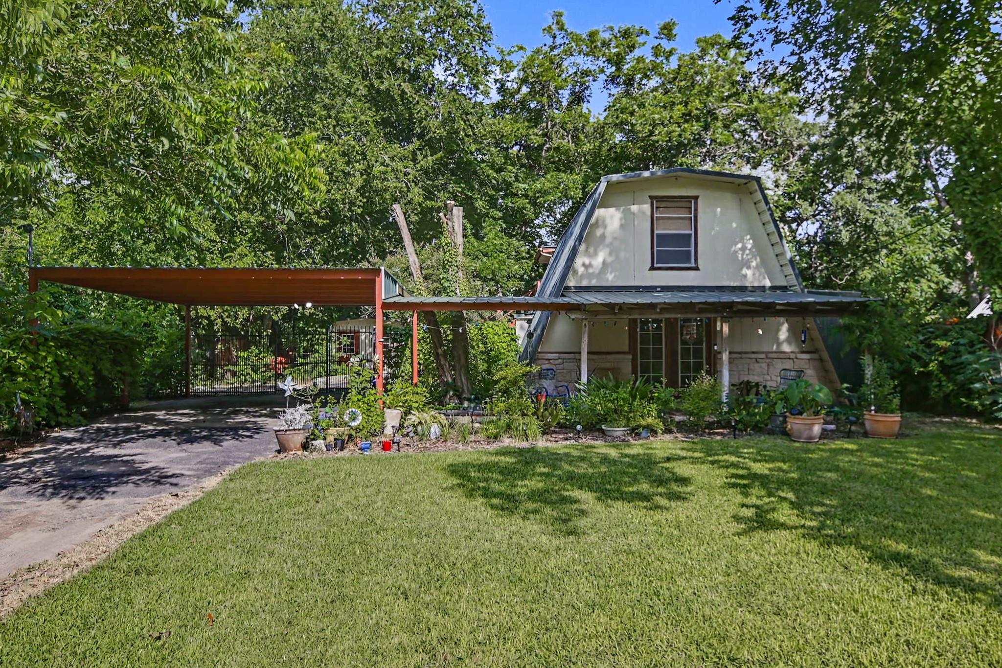 A distinctive A-frame residence featuring an exte