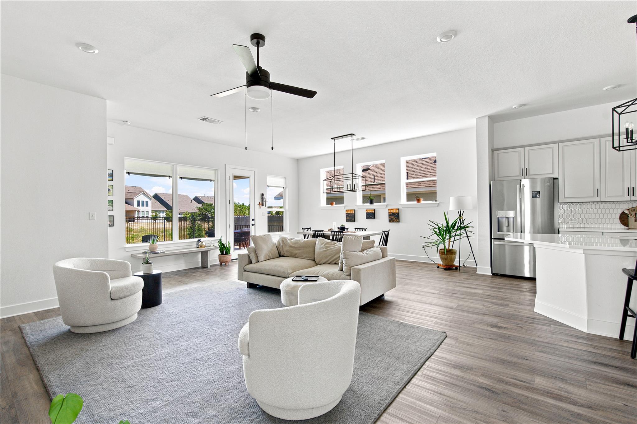 An open floorplan seamlessly connects the living 