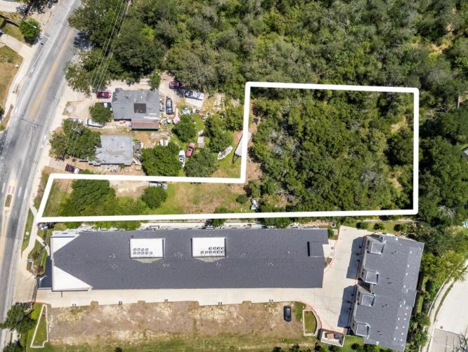An aerial perspective reveals a prime development