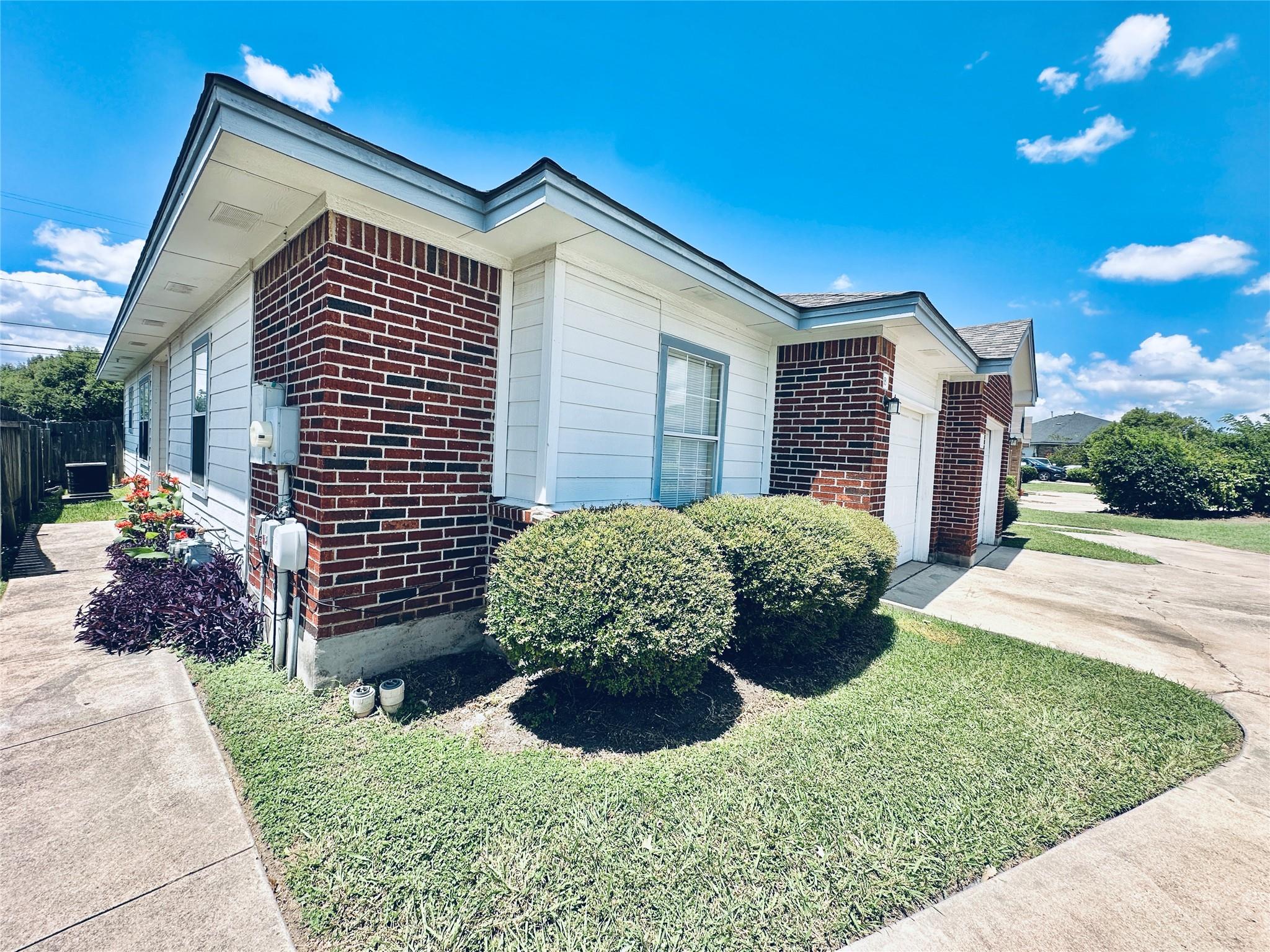 A classic brick and siding exterior welcomes you 