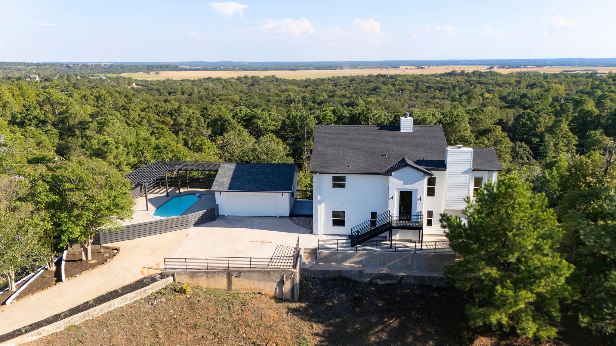Perched on a hill, this contemporary home overloo
