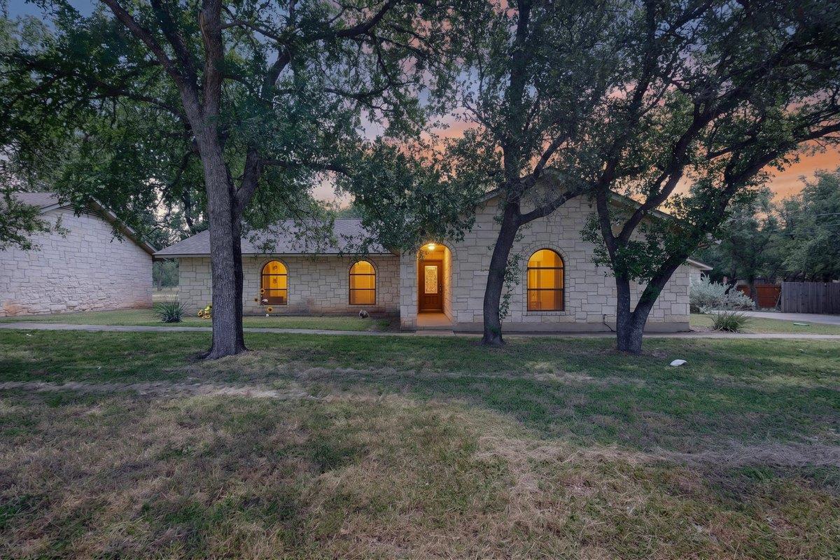 Timeless stone facade with charming arched window