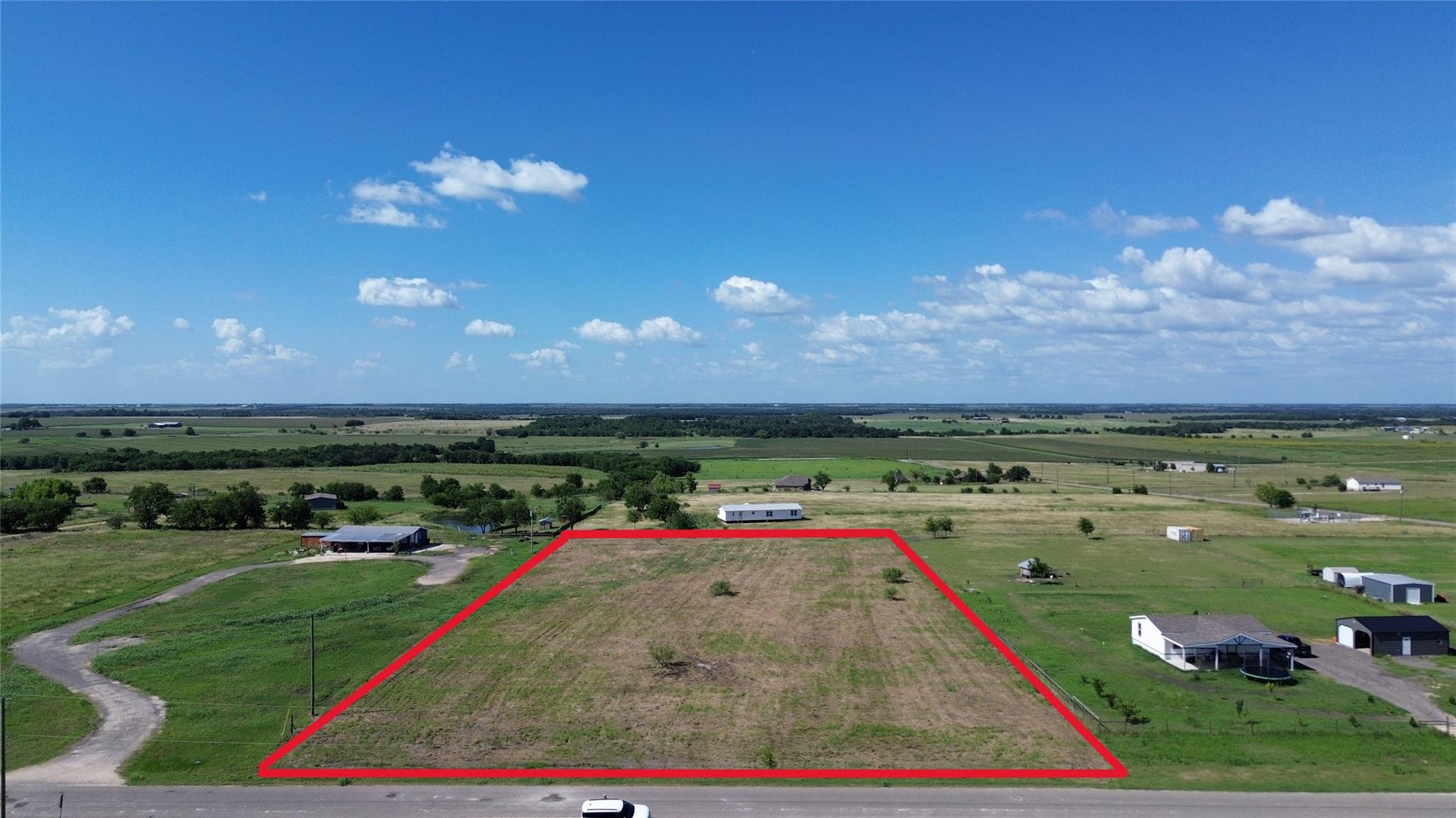 A spacious, buildable parcel with unobstructed vi