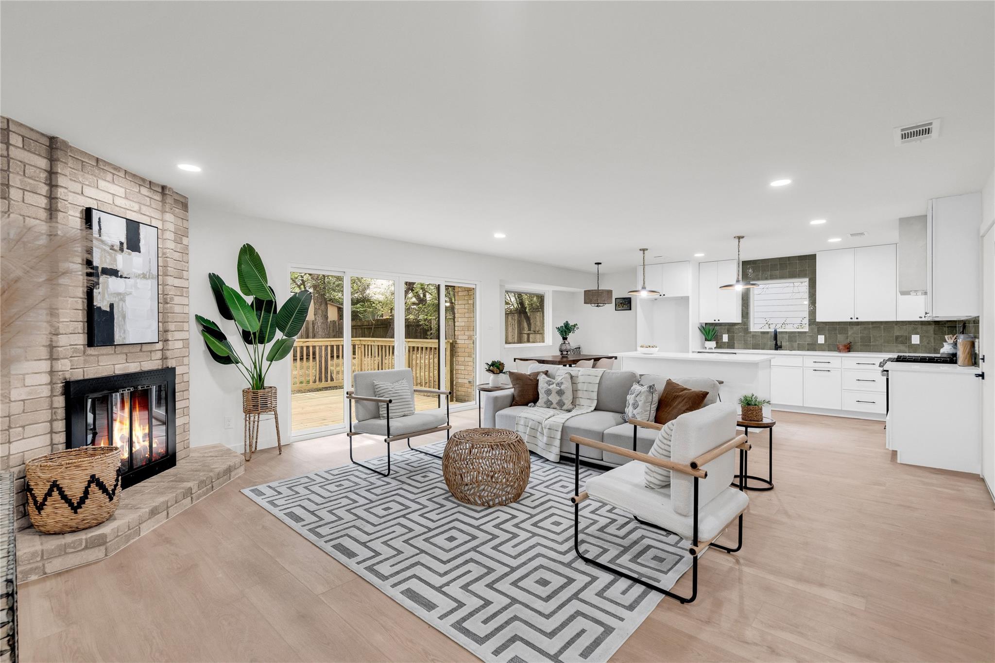An inviting open-concept living space features a 