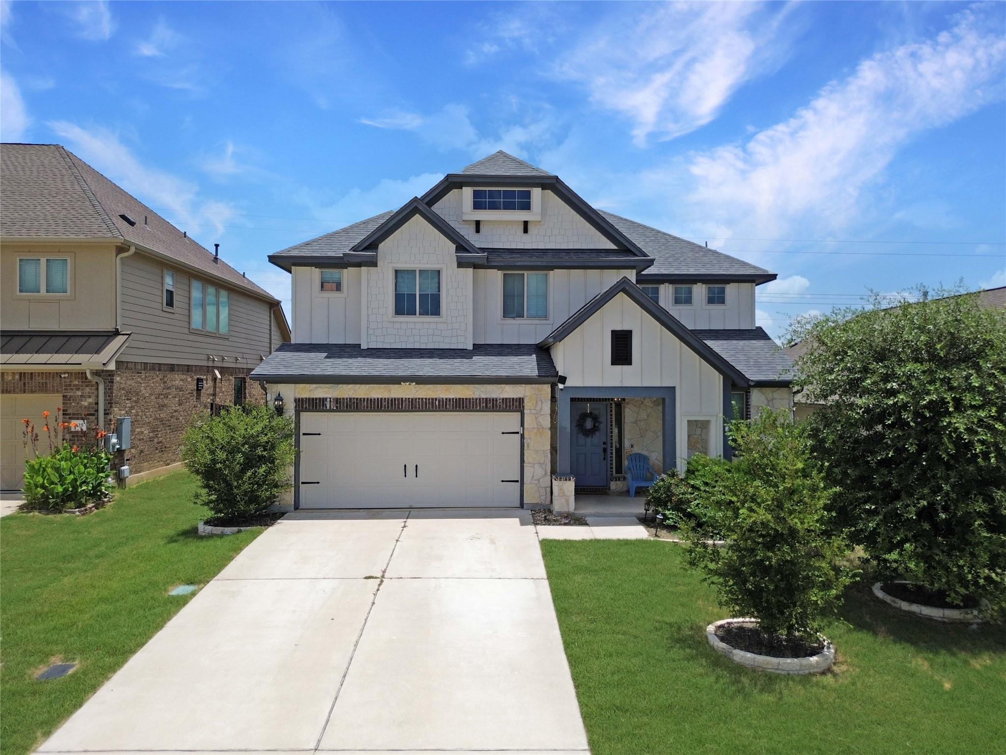 Discover a charming two-story residence with a pa