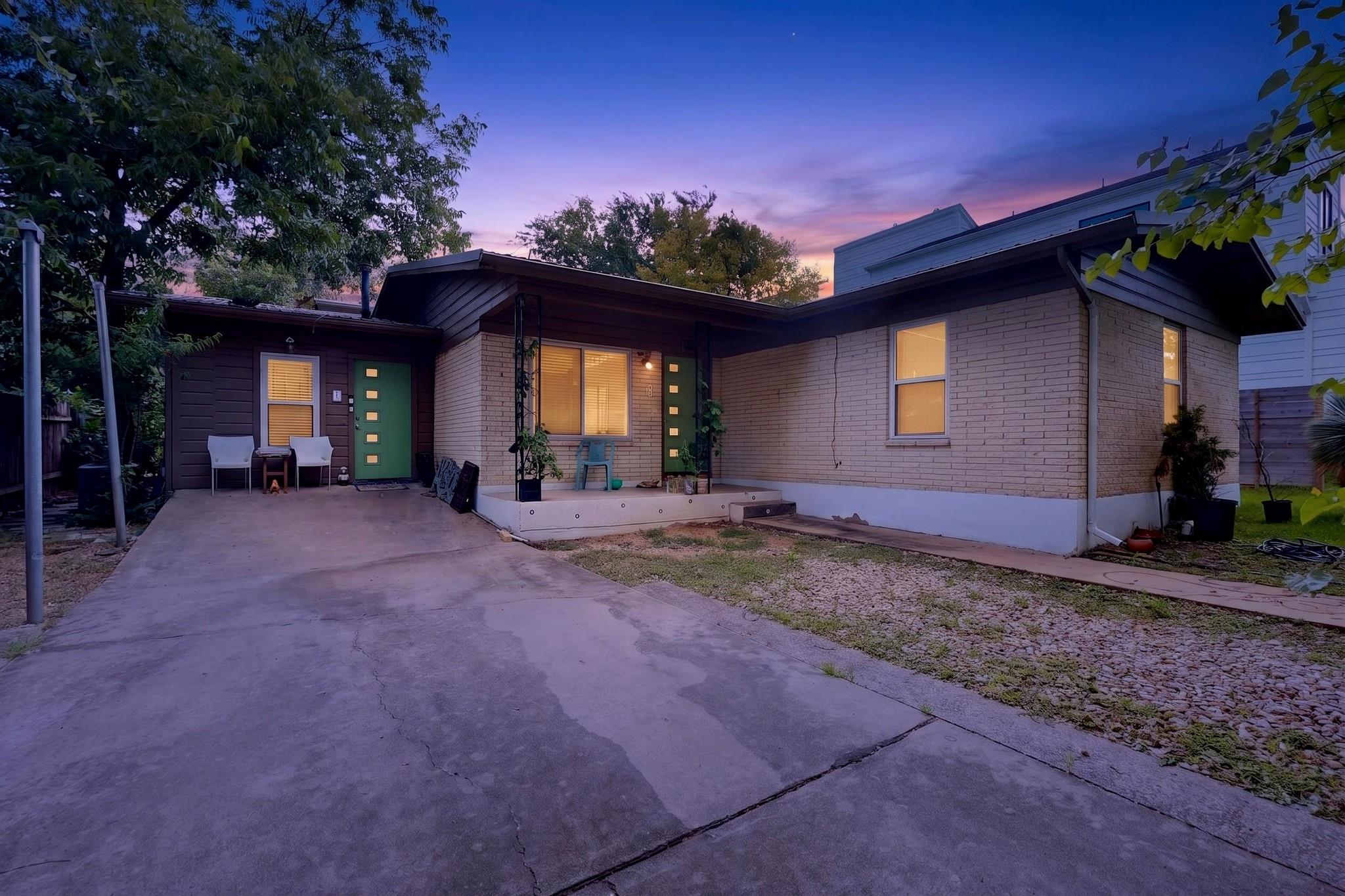 A welcoming bungalow offers an inviting front por