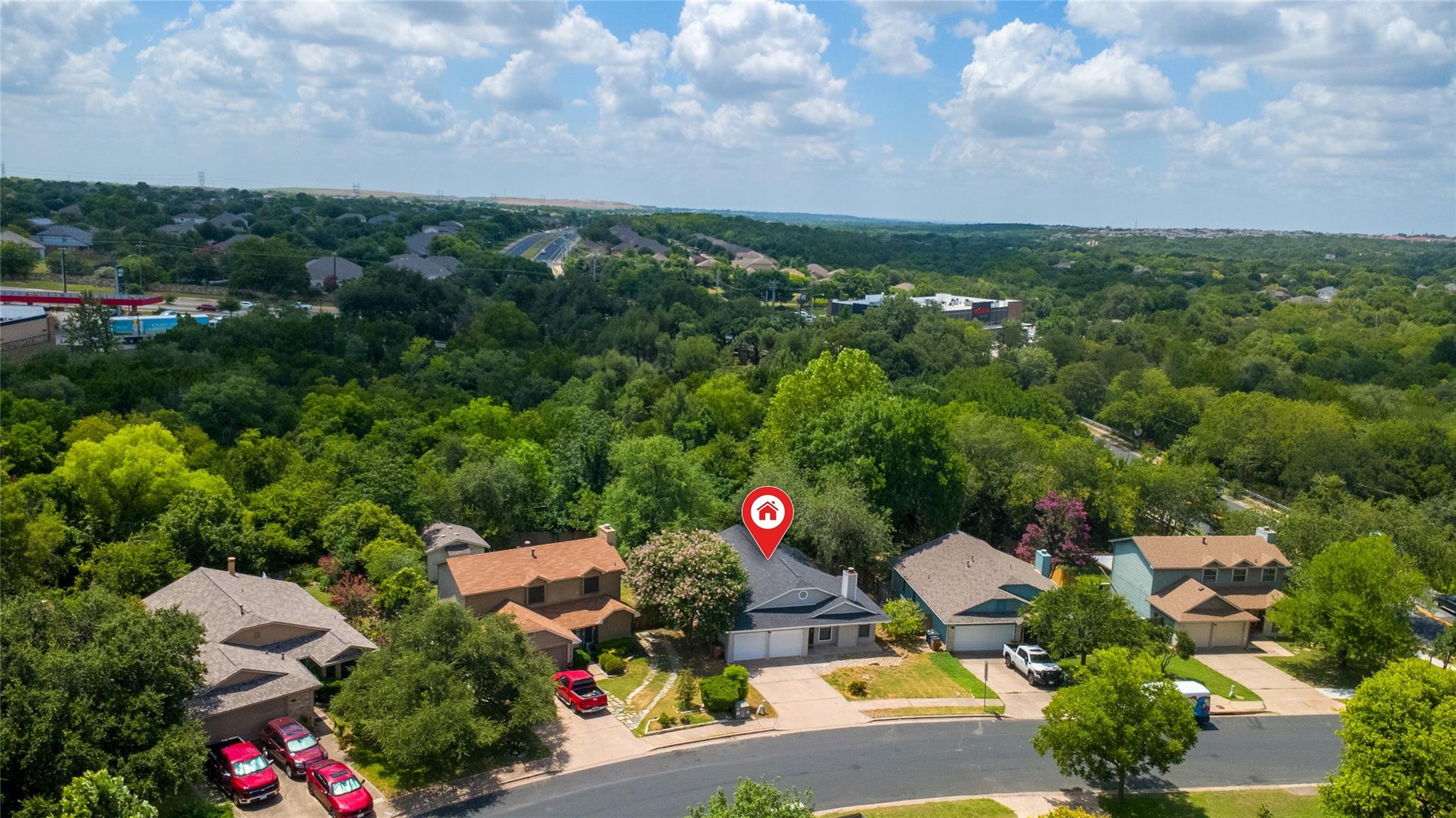 Nestled in a verdant landscape, discover this cha
