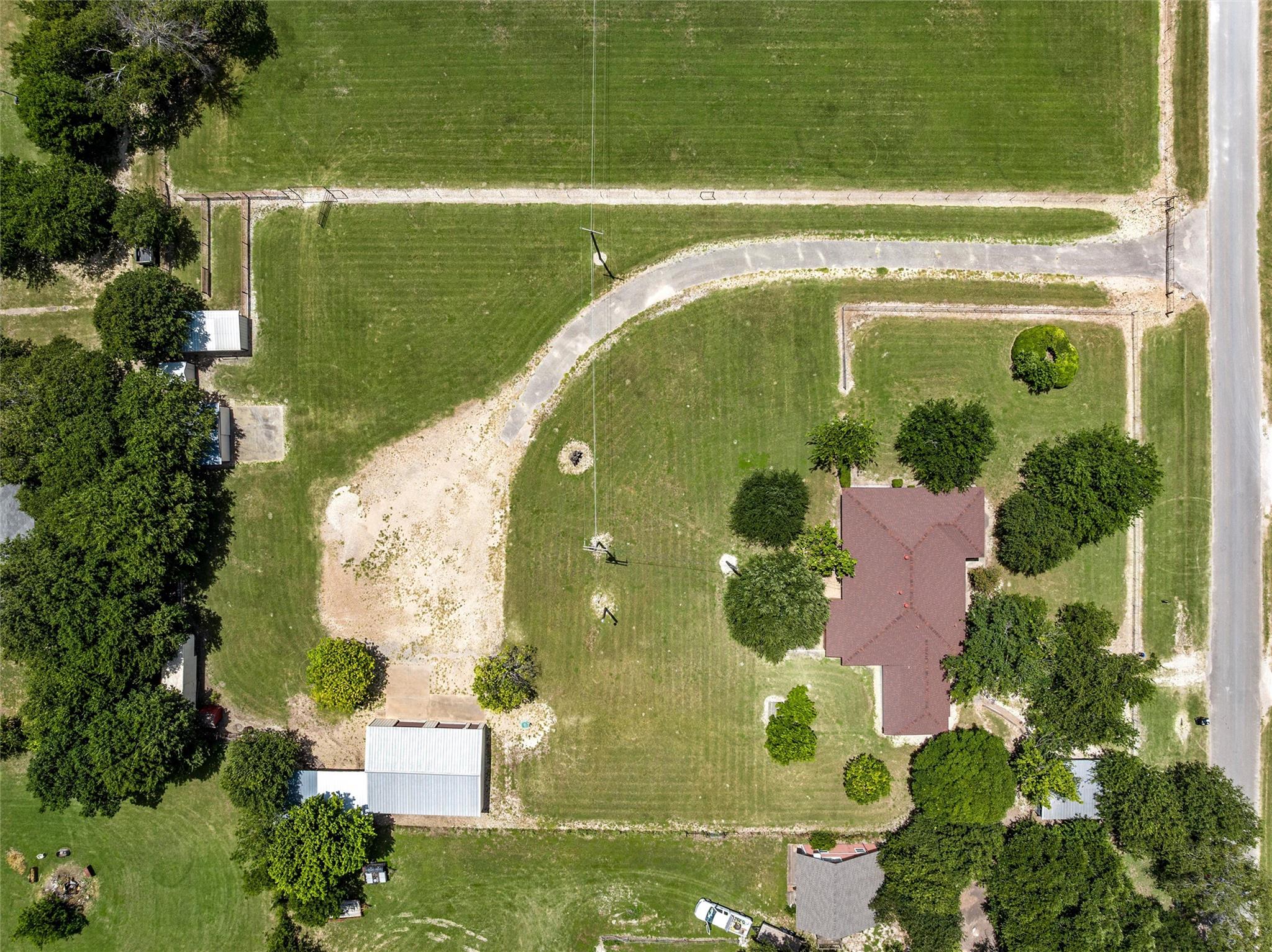 An aerial perspective reveals a vast estate with 
