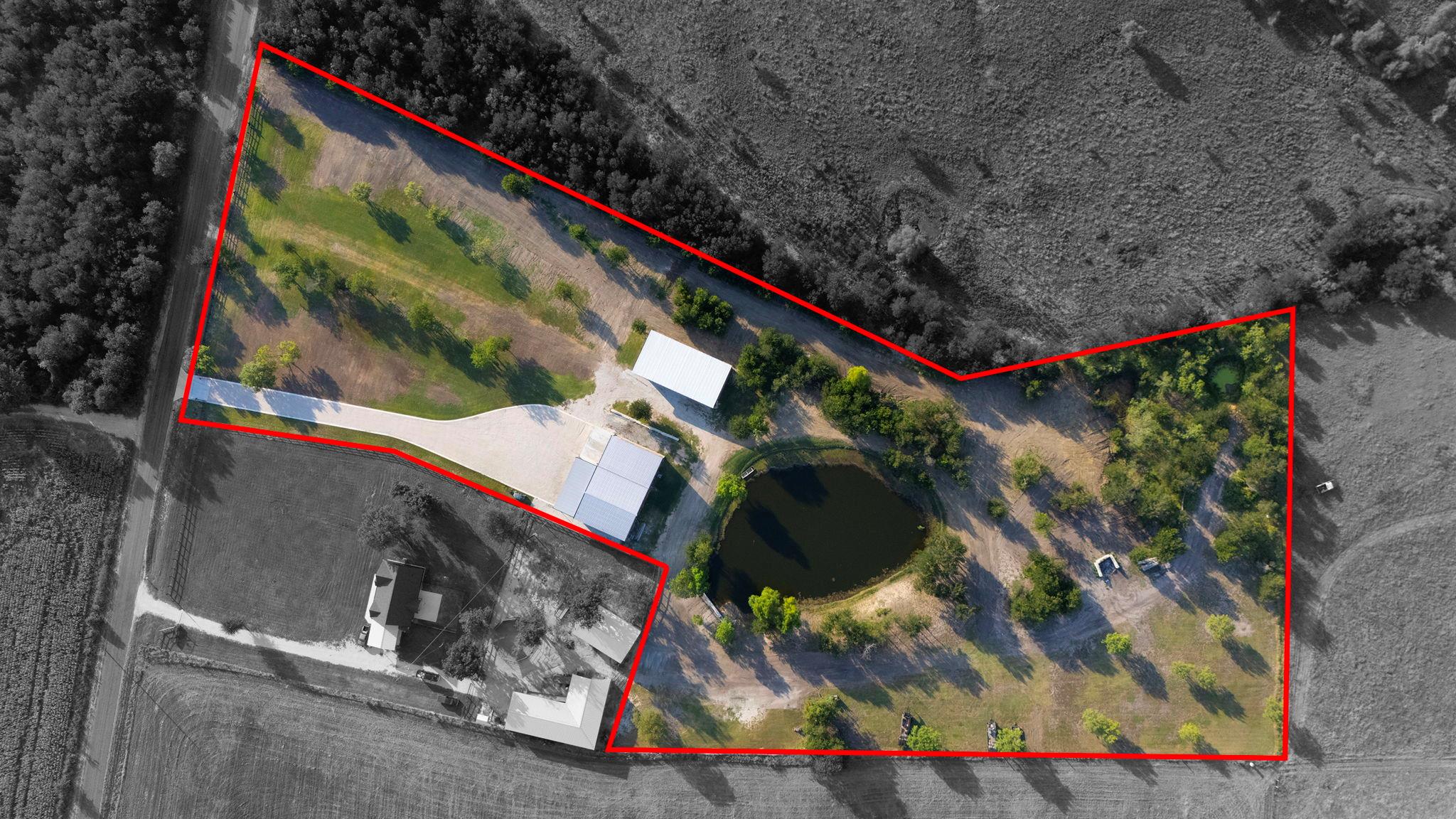 An aerial view showcases a sprawling property wit