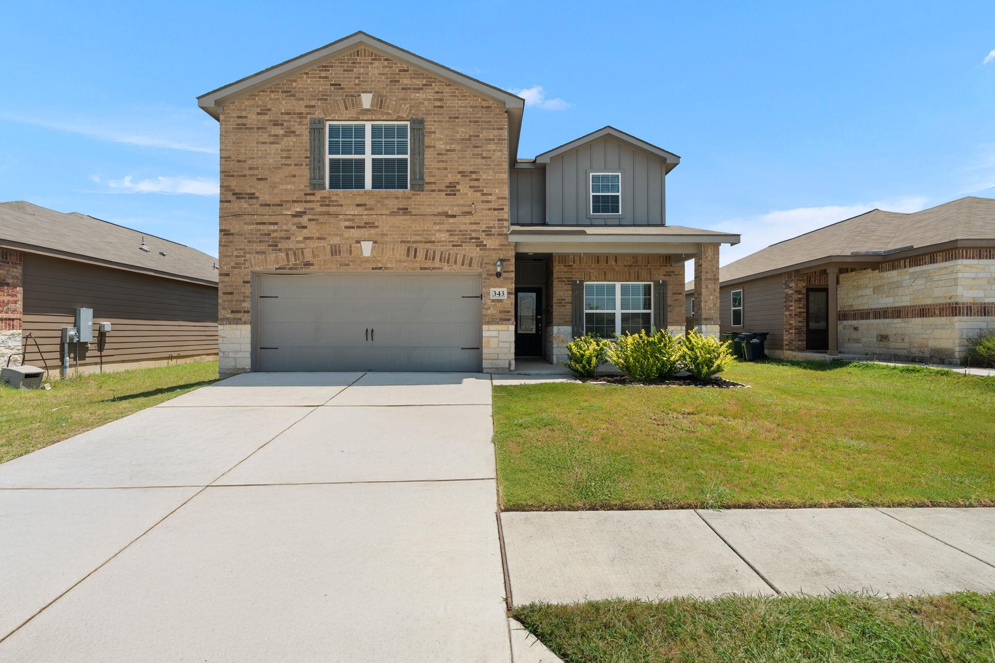 A classic brick facade provides a welcoming entry